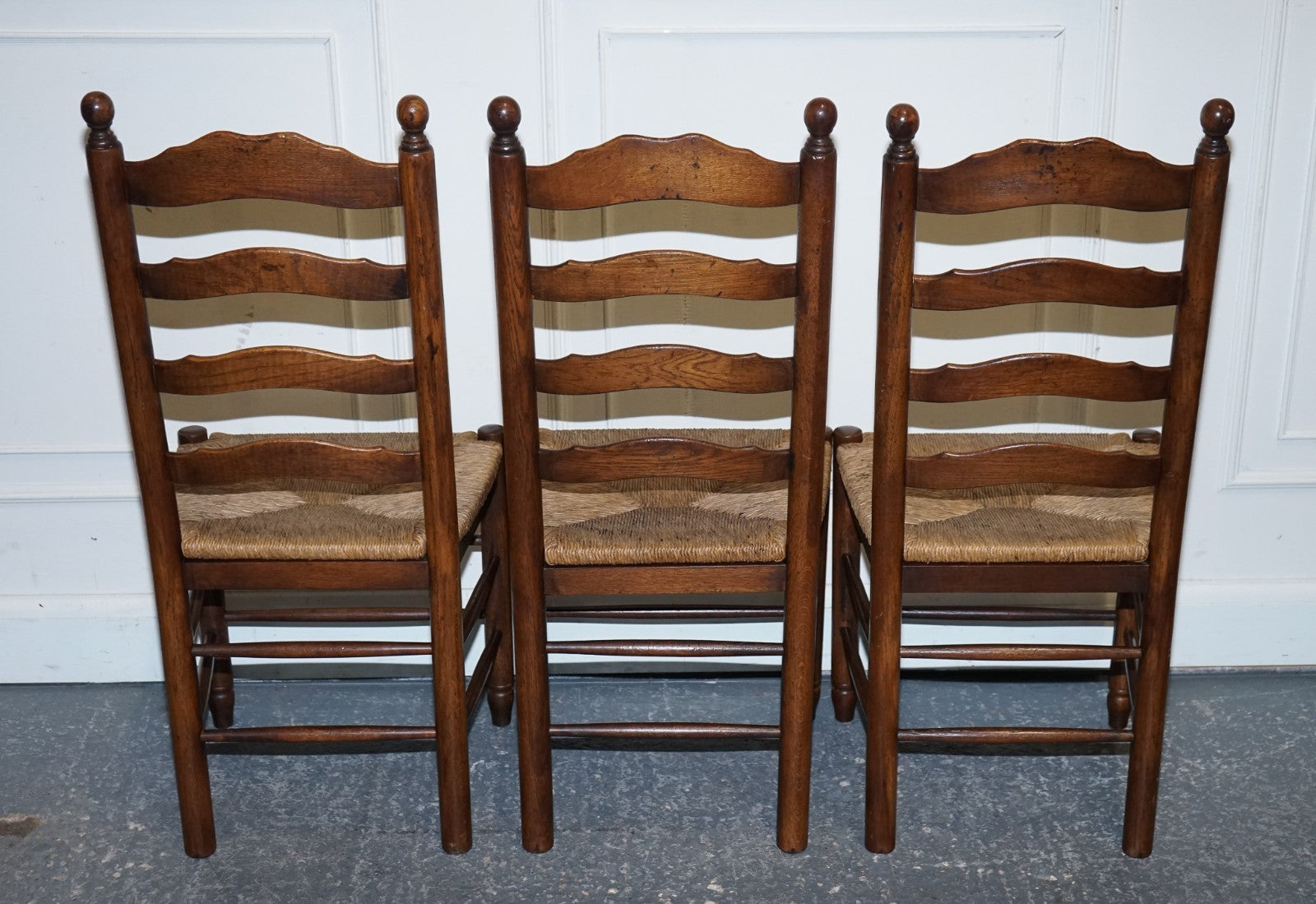 SET OF SIX ANTIQUE ENGLISH 19TH CENTURY LADDERBACK RUSH SEAT DINING CHAIRS