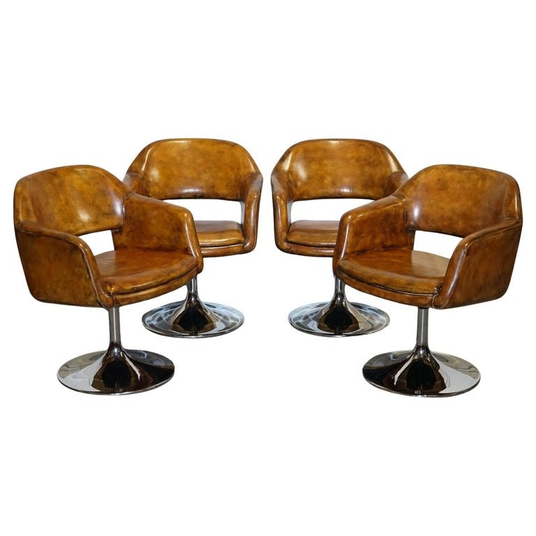 SET OF FOUR RESTORED HAND DYED LEATHER LARGO JOHANSON DESIGN SWIVEL ARMCHAIRS