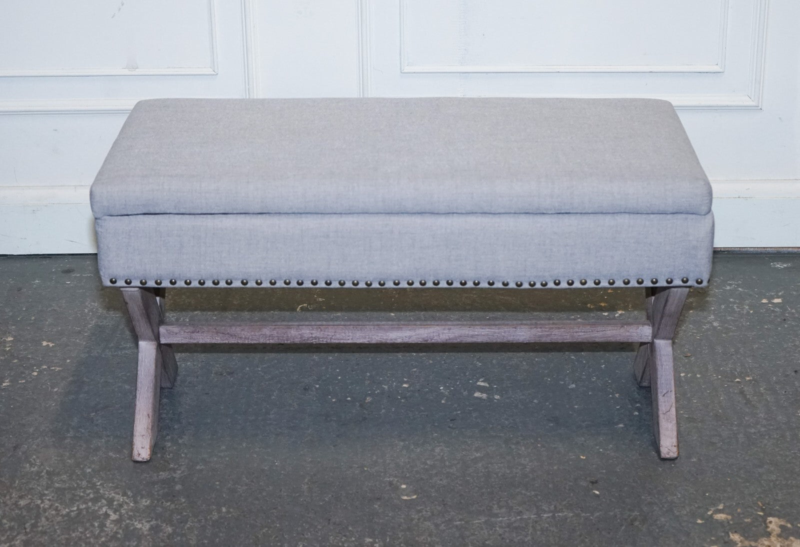 LOVELY VINTAGE GREY TAUPE FABRIC OTTOMAN WITH STORAGE SPACE RAISED ON X FRAME