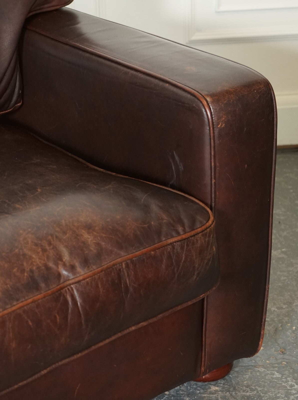 VINTAGE DISTRESSED BROWN LEATHER TWO TO THREE SEATER SOFA