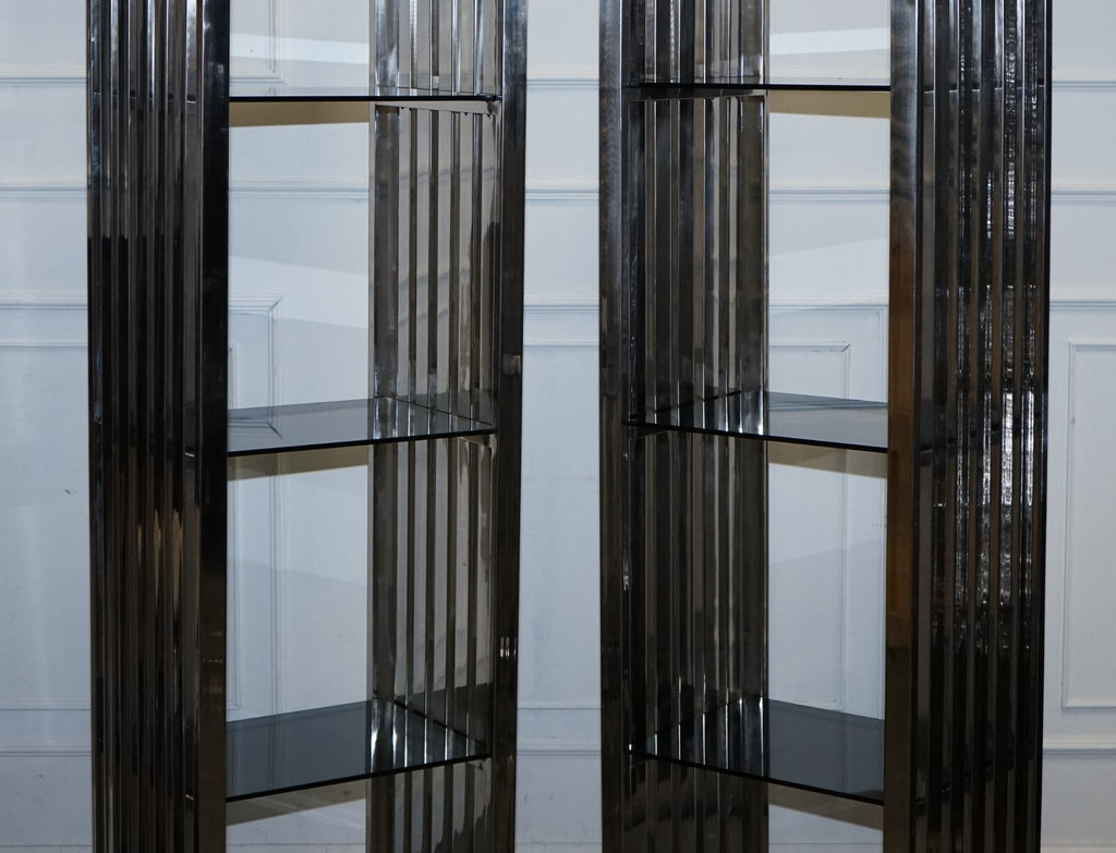 STUNNING CASA PADRINO STAINLESS STEEL PAIR OF BOOKCASES AND SMOKED GLASS SHELFS