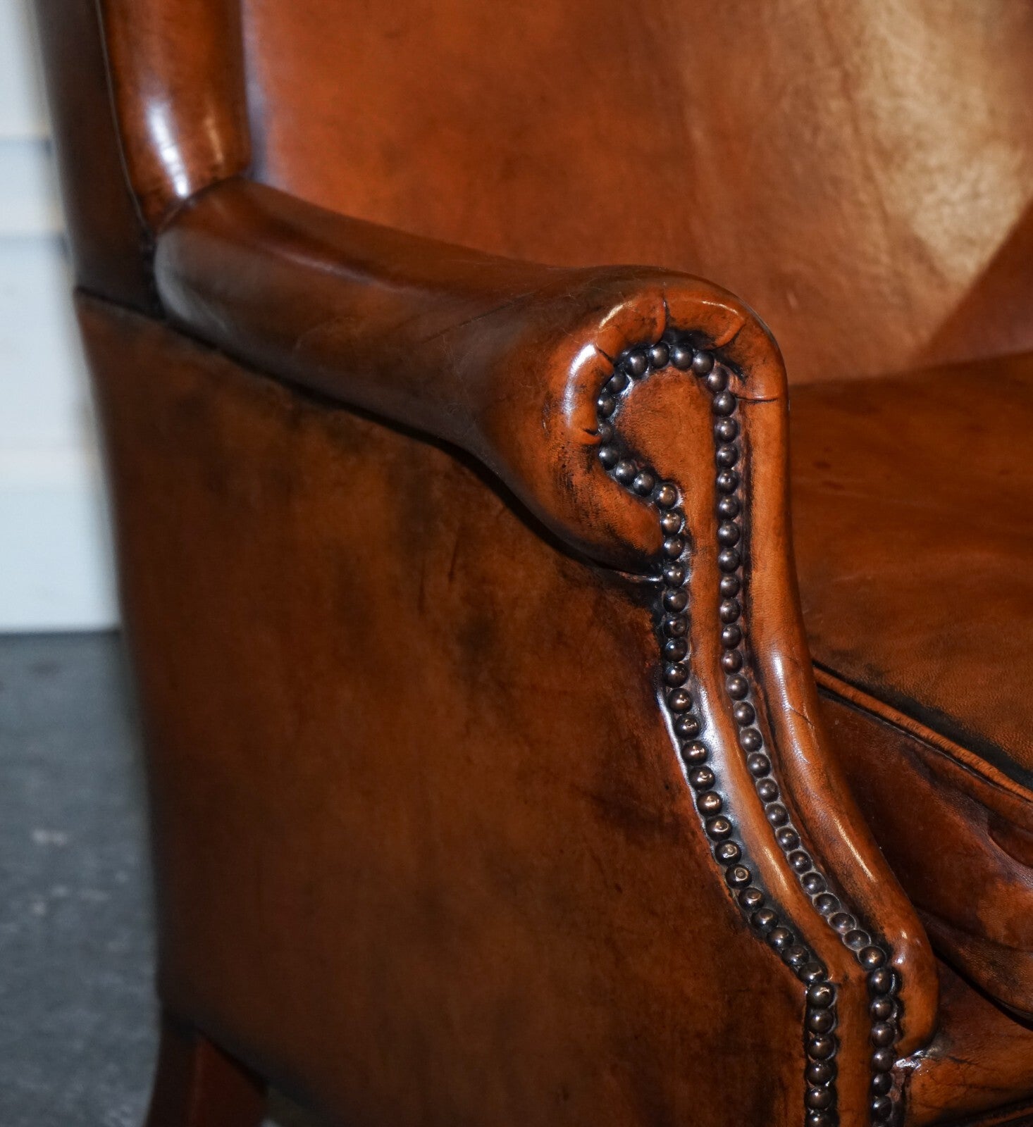 ANTIQUE PAIR OF DUTCH HAND DYED BROWN CATTLE LEATHER WINGBACK ARMCHAIRS