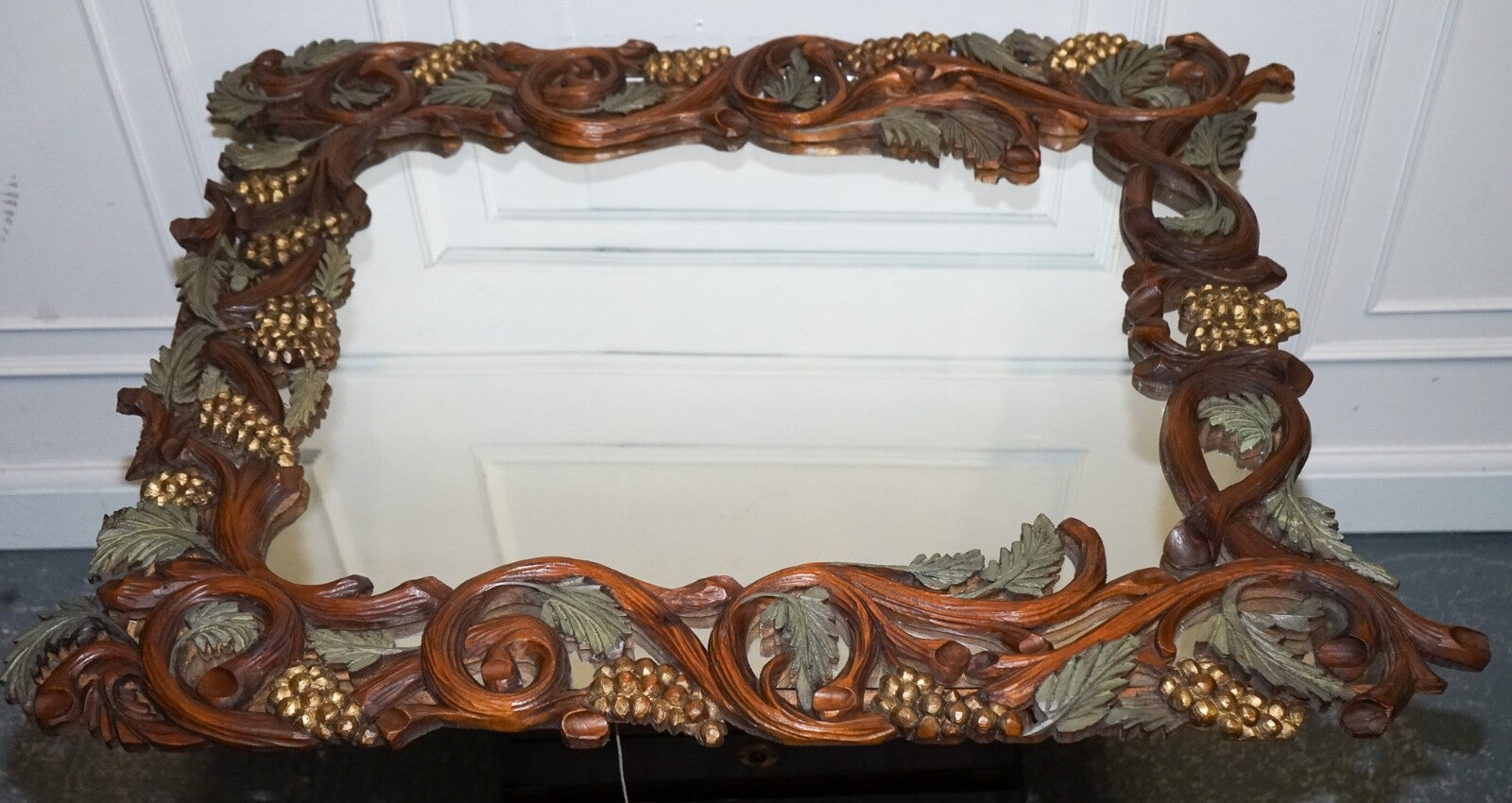 VINTAGE BLACK FORREST STYLE HEAVILY CARVED WOODEN WALL MIRROR VERY DECORATIVE