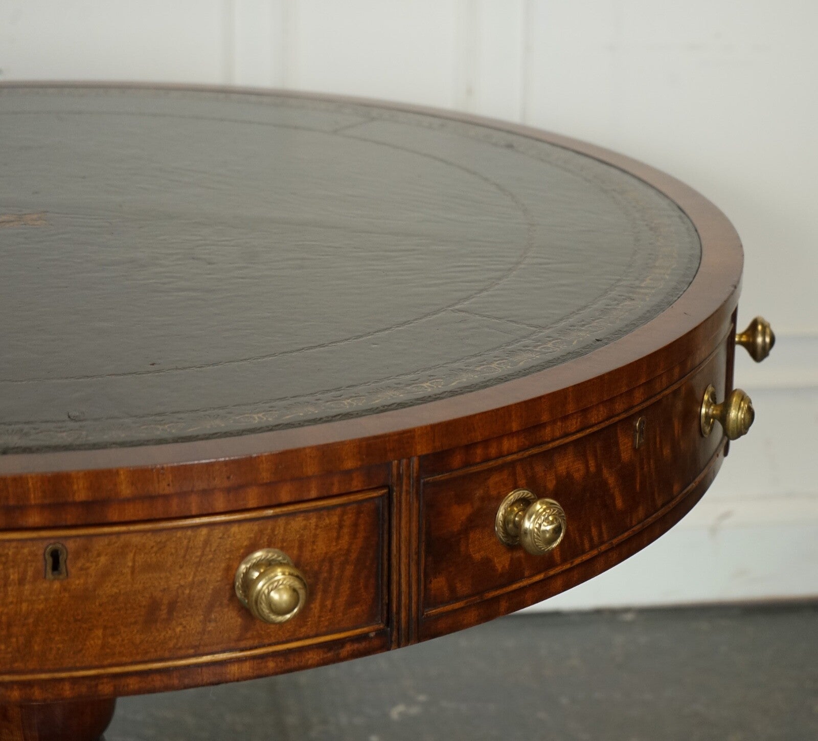 FINE RESTORED REGENCY STYLE DRUM TOP LIBRARY TABLE WITH AGED GREEN LEATHER TOP