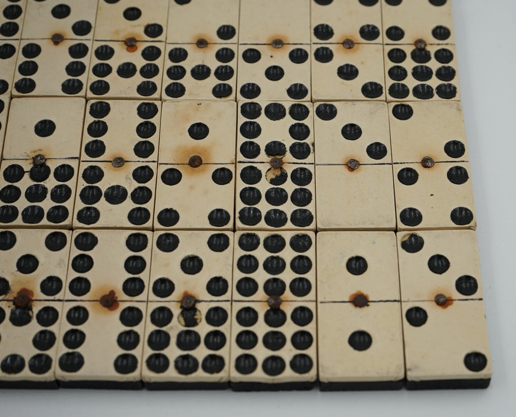 LATE 19TH CENTURY BOX OF TRADITIONAL GAME NINER DOMINOS WITH STUNNING PATINA