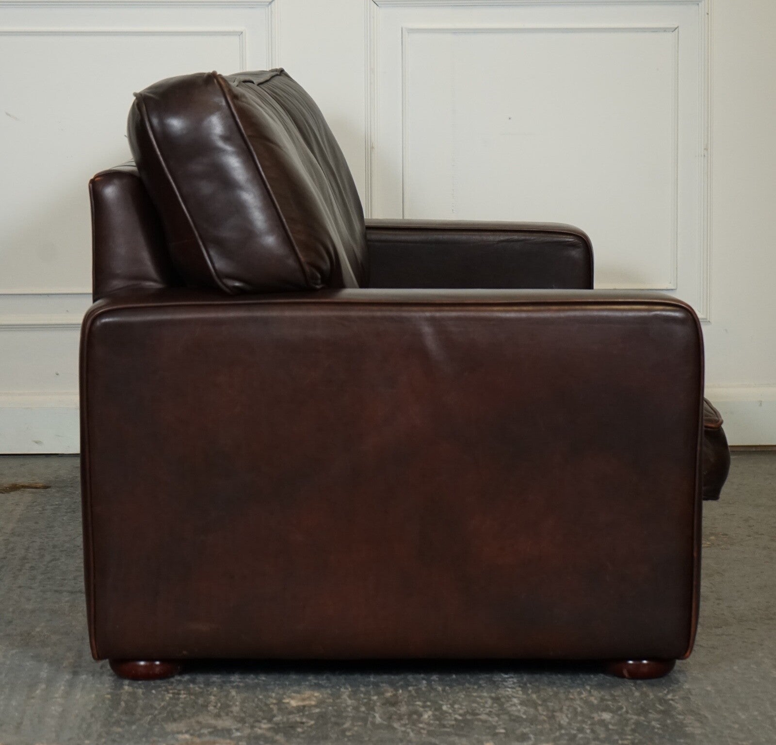 VINTAGE DISTRESSED BROWN LEATHER TWO TO THREE SEATER SOFA