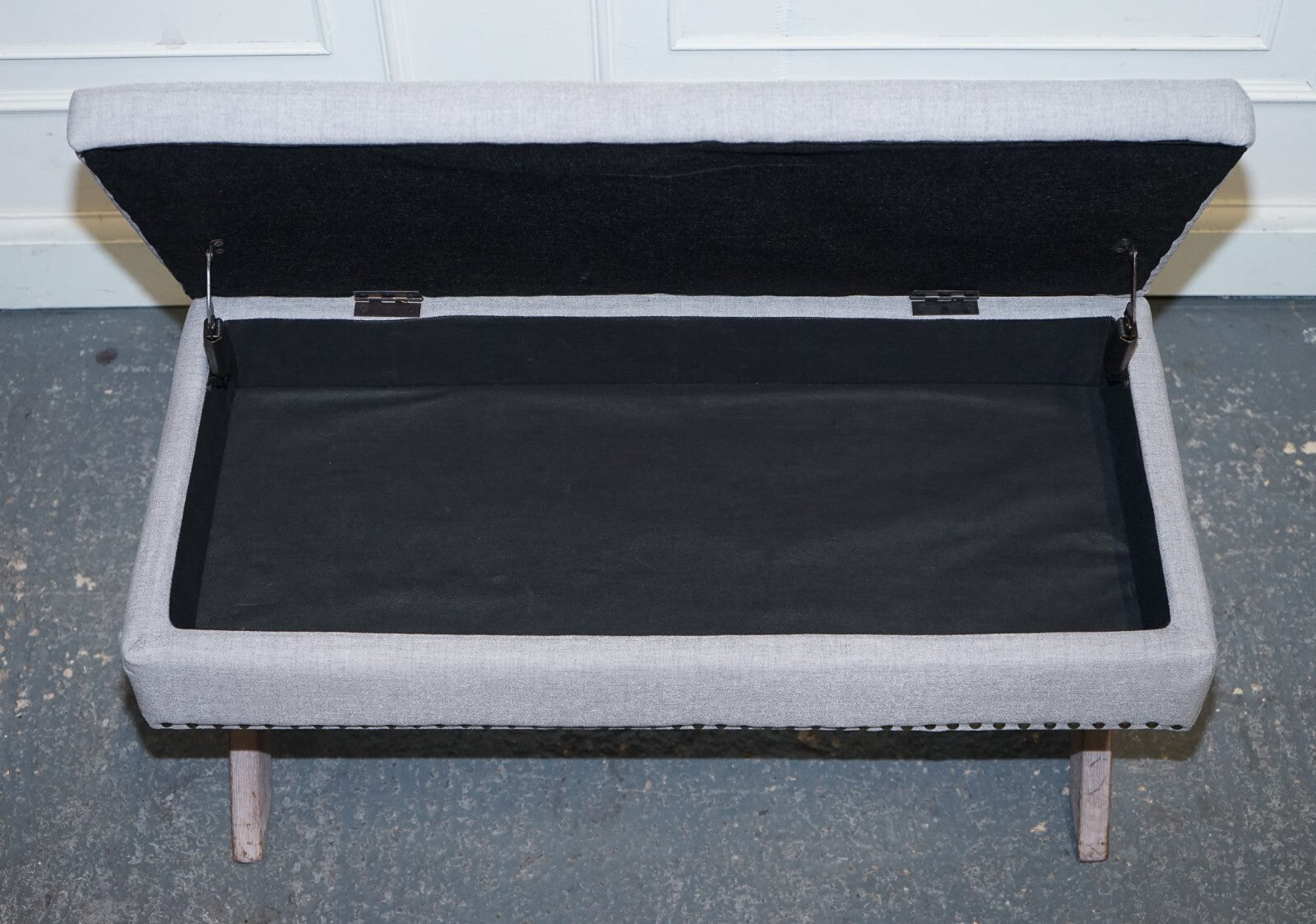 LOVELY VINTAGE GREY TAUPE FABRIC OTTOMAN WITH STORAGE SPACE RAISED ON X FRAME