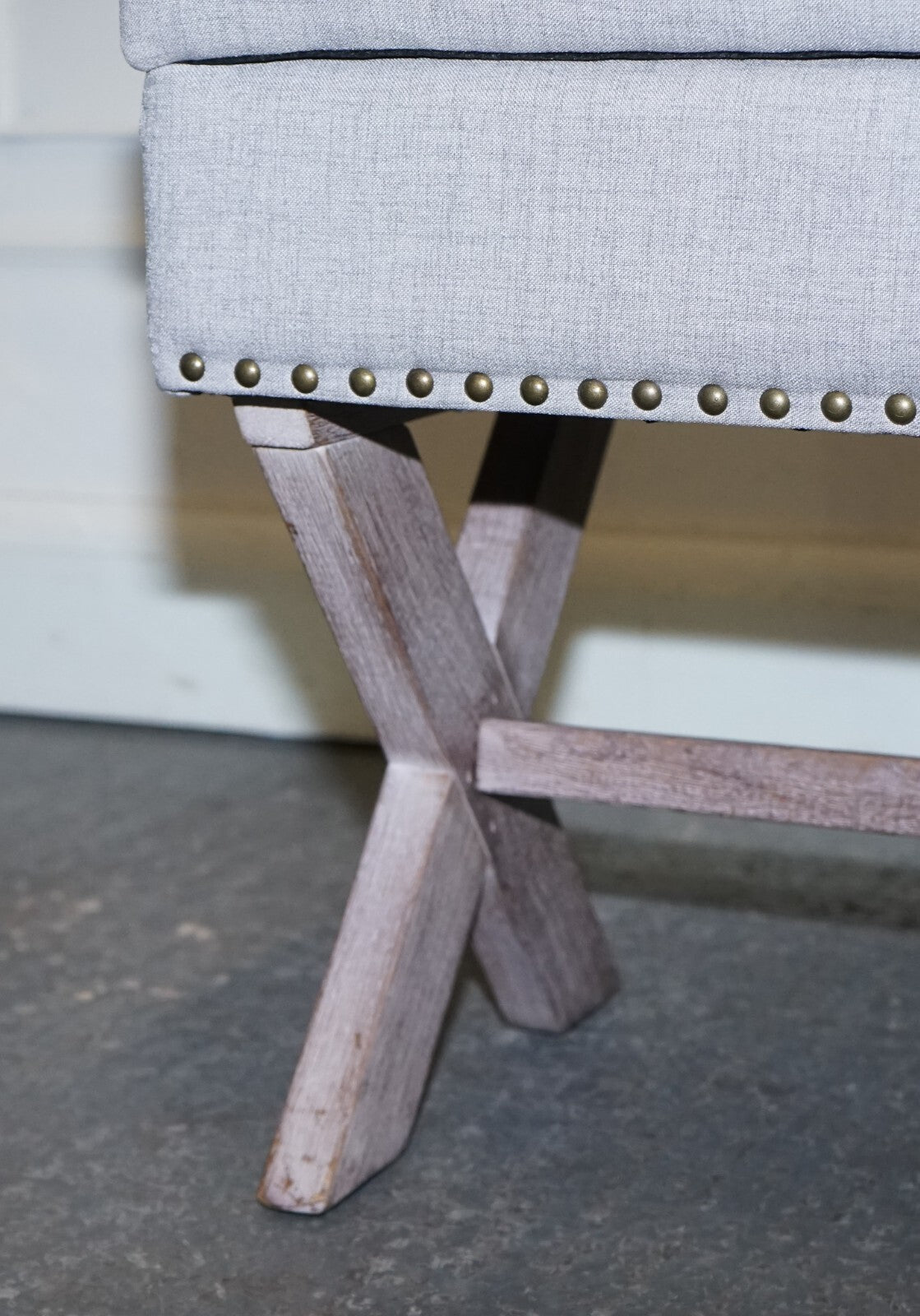 LOVELY VINTAGE GREY TAUPE FABRIC OTTOMAN WITH STORAGE SPACE RAISED ON X FRAME