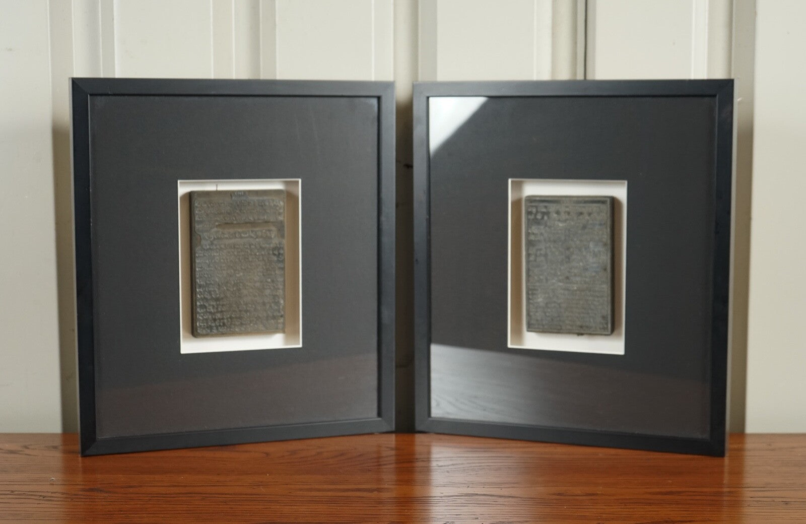 PAIR OF ARABIC WRITINGS FRAMED IN MODERN BLACK FRAMES
