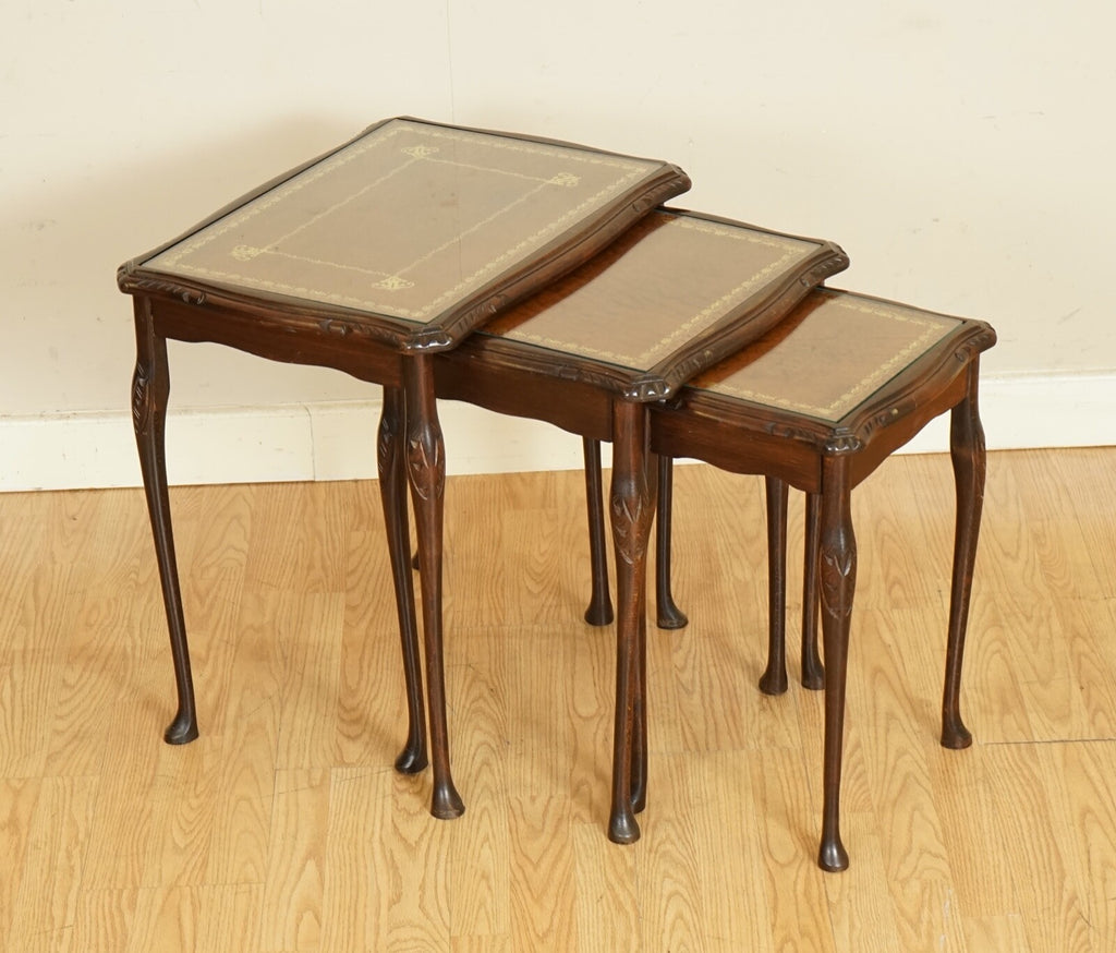 MAHOGANY NEST OF TABLES QUEEN ANNE STYLE LEGS WITH BROWN EMBOSSED LEATHER TOP
