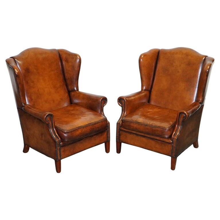 ANTIQUE PAIR OF DUTCH HAND DYED BROWN CATTLE LEATHER WINGBACK ARMCHAIRS