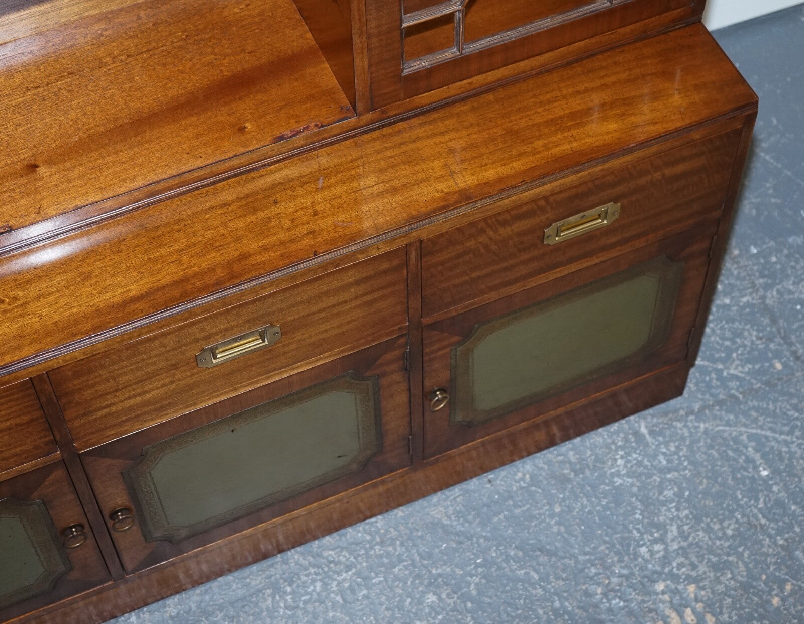 VINTAGE BEVAN FUNNELL MILITARY CAMPAIGN BOOKCASE WITH EMBOSSED LEATHER DOORS
