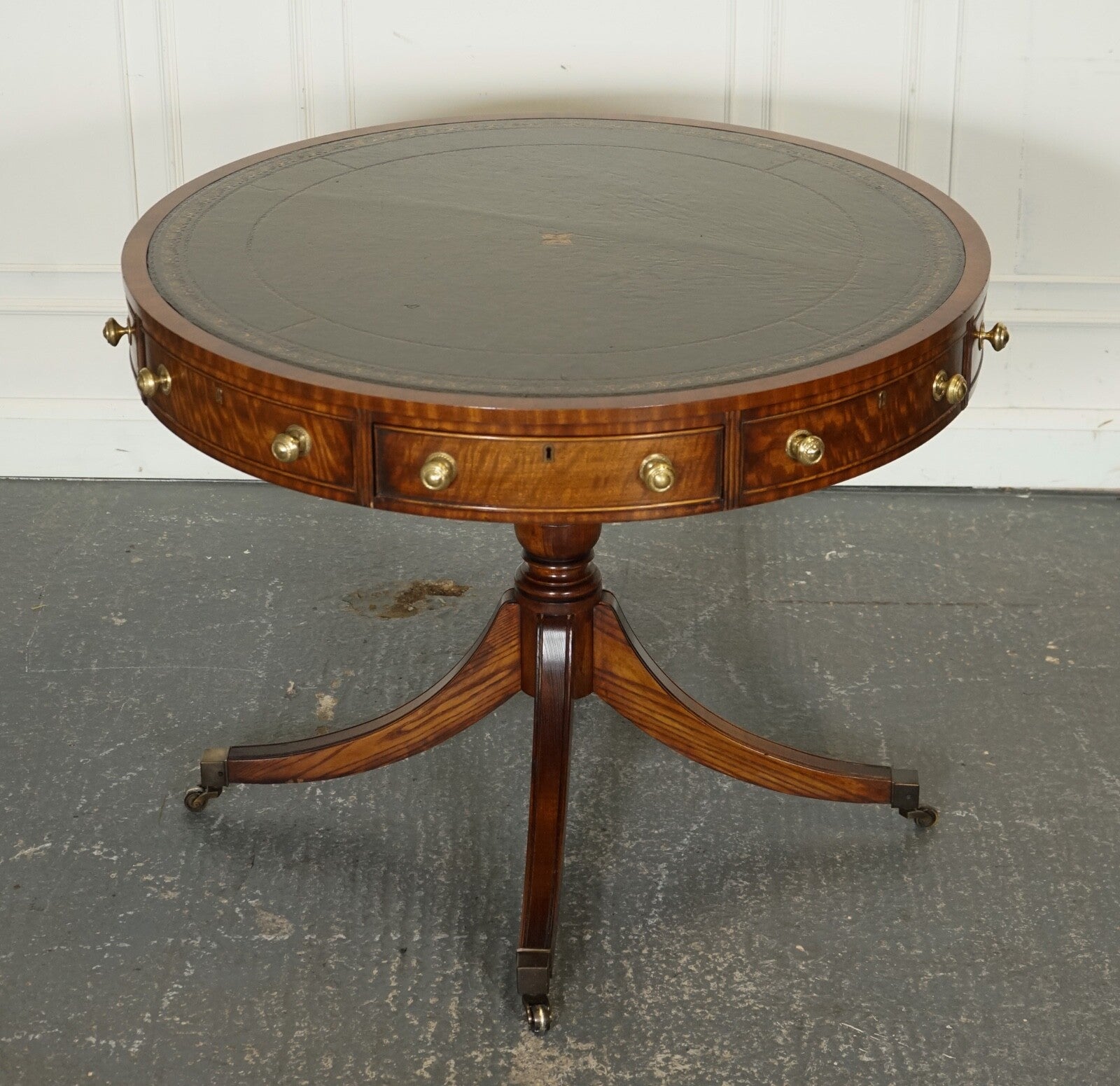 FINE RESTORED REGENCY STYLE DRUM TOP LIBRARY TABLE WITH AGED GREEN LEATHER TOP