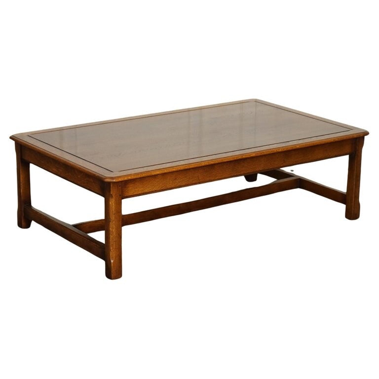 STUNNING LARGE OAK VINTAGE COFFEE TABLE WITH NICE GRAIN OAK TOP AND H FRAME
