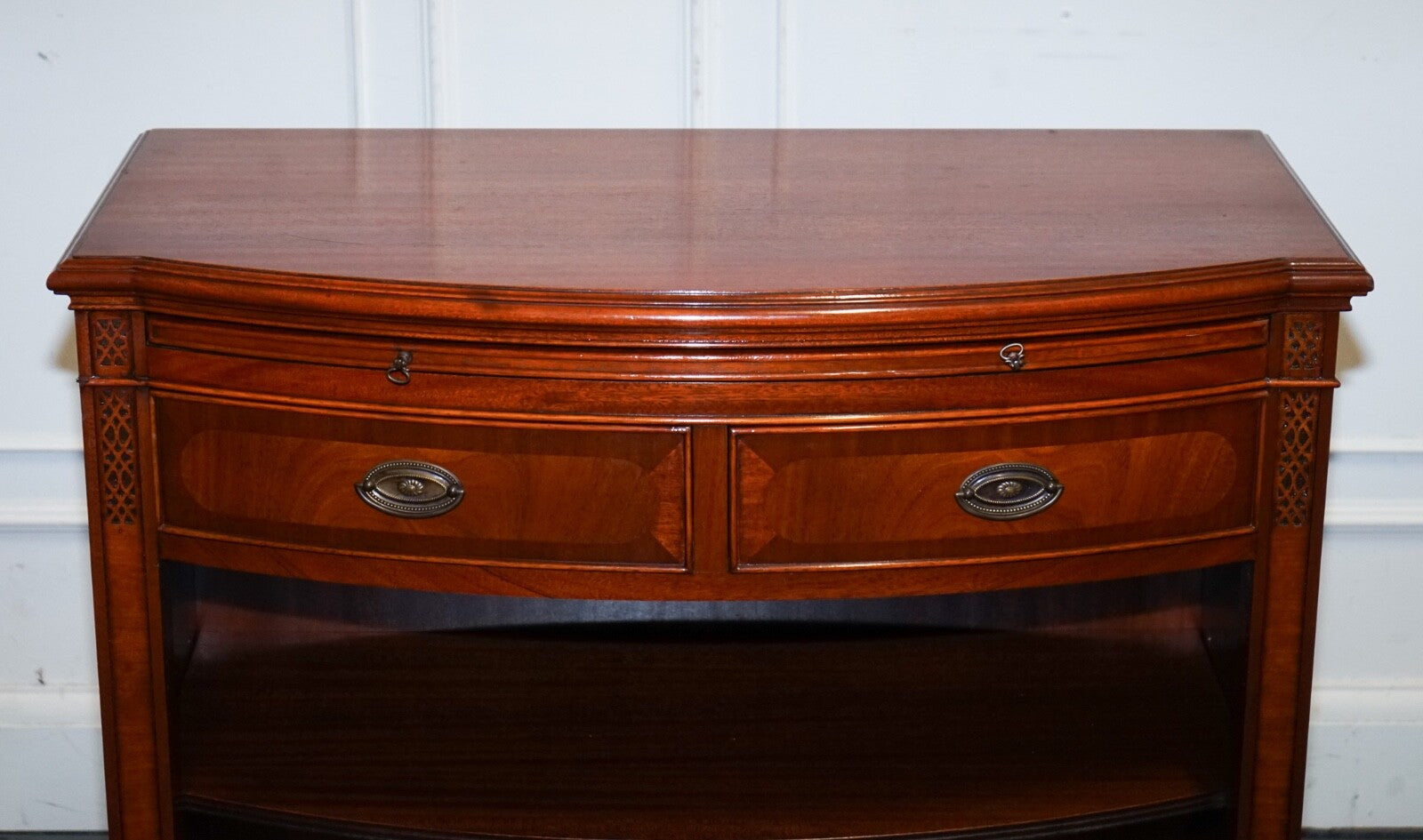 VINTAGE SERPENTINE BOW FRONT DWARF OPEN BOOKCASE WITH TWO DRAWERS BY WADE