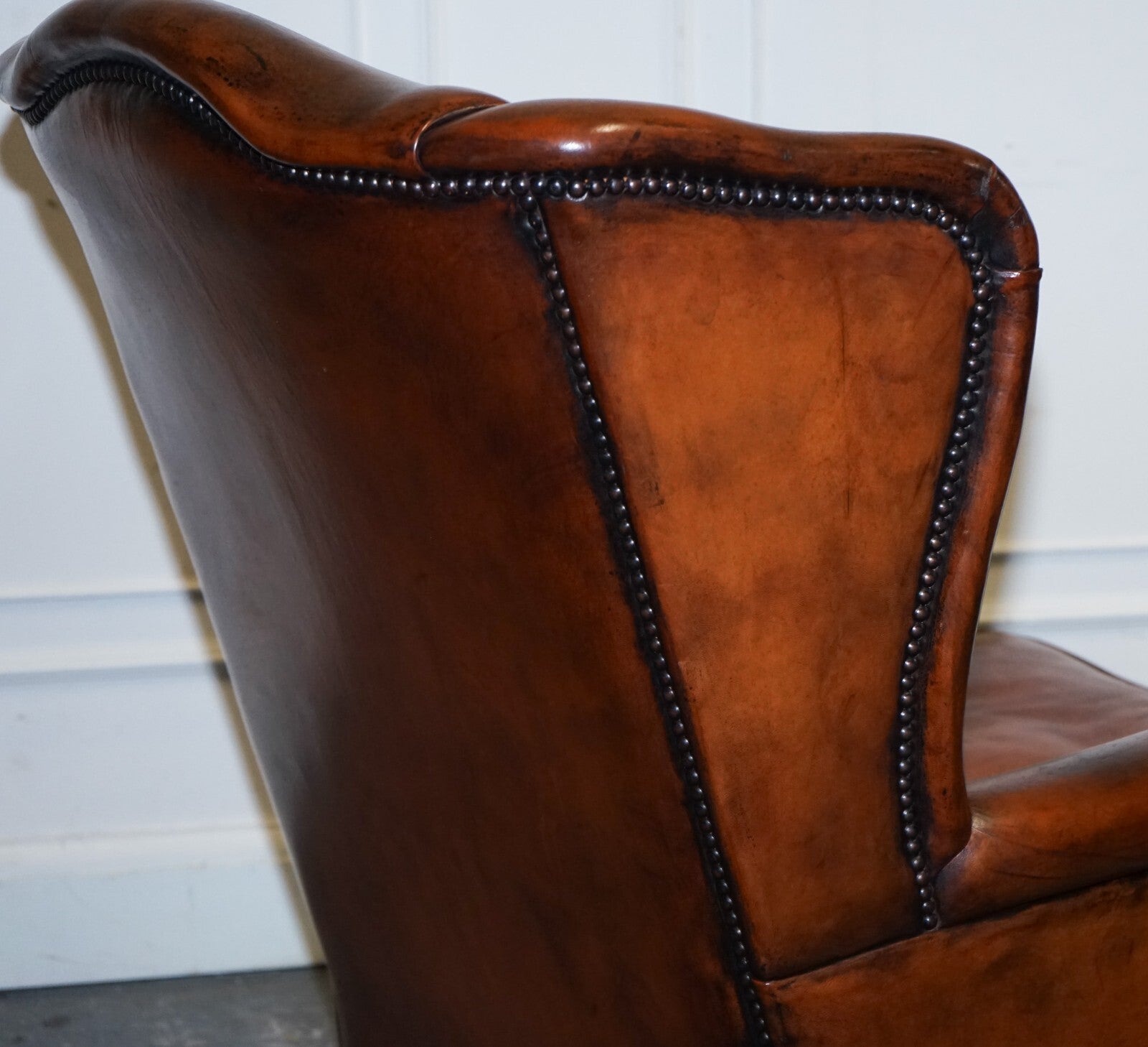 ANTIQUE PAIR OF DUTCH HAND DYED BROWN CATTLE LEATHER WINGBACK ARMCHAIRS