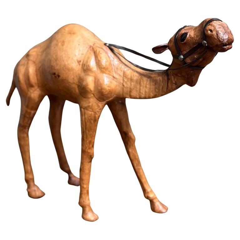 LiBERTY'S LONDON CAMEL SCULPTURE WITH LOVELY AGED LEATHER ON HAND CARVED WOOD
