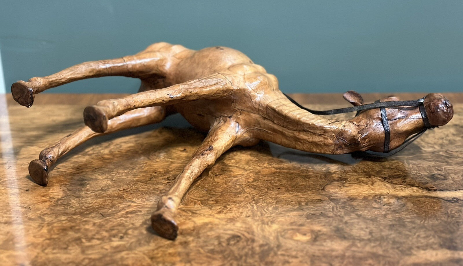 LiBERTY'S LONDON CAMEL SCULPTURE WITH LOVELY AGED LEATHER ON HAND CARVED WOOD