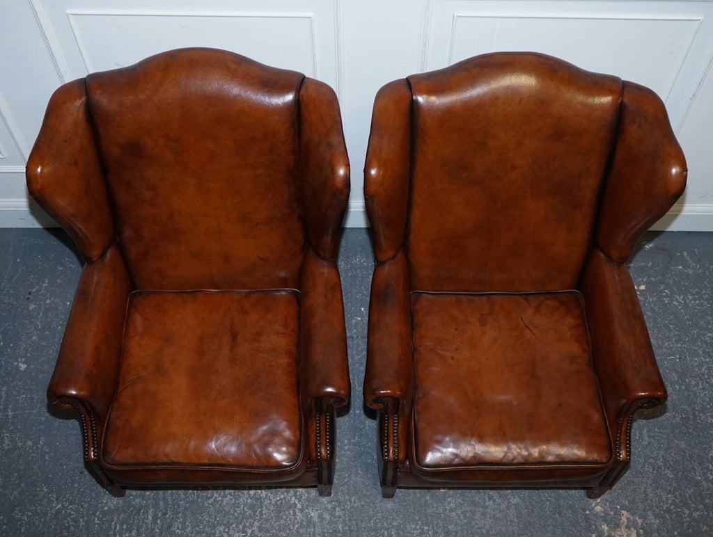 ANTIQUE PAIR OF DUTCH HAND DYED BROWN CATTLE LEATHER WINGBACK ARMCHAIRS