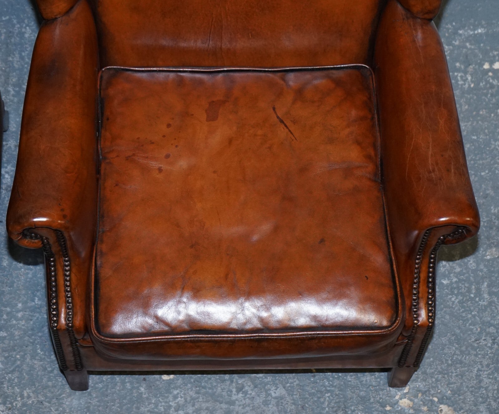 ANTIQUE PAIR OF DUTCH HAND DYED BROWN CATTLE LEATHER WINGBACK ARMCHAIRS