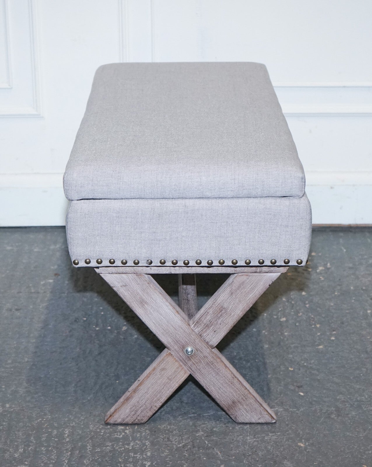 LOVELY VINTAGE GREY TAUPE FABRIC OTTOMAN WITH STORAGE SPACE RAISED ON X FRAME